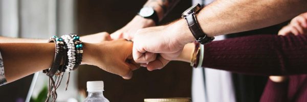 hands in of all team members